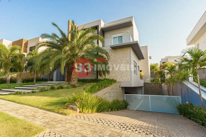 Casa de Condomínio à venda com 4 quartos, 560m² - Foto 1